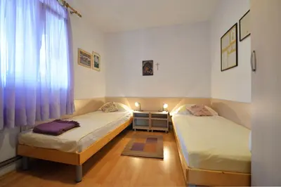 Krevet ili kreveti u jedinici u objektu Holiday Apartment Ivan