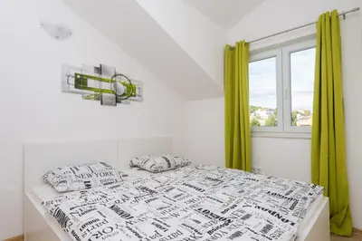 Krevet ili kreveti u jedinici u objektu M.G Apartments