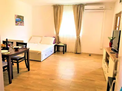 Krevet ili kreveti u jedinici u objektu Apartments Village