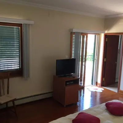 TV i/ili zabavni centar u objektu Americana Luxury Apartments