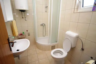 Kupaonica u objektu Apartments by the sea Rogoznica - 5269