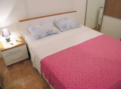 Krevet ili kreveti u jedinici u objektu Family friendly house with a swimming pool Jezera, Murter - 5124
