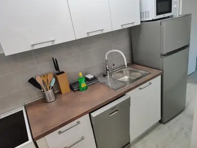 Kuhinja ili čajna kuhinja u objektu Apartmani Grebastica