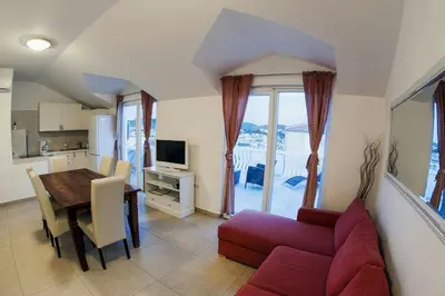 TV i/ili zabavni centar u objektu Apartments Leut