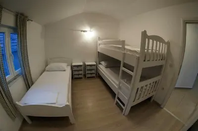 Krevet ili kreveti u jedinici u objektu Apartments Leut