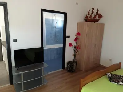 TV i/ili zabavni centar u objektu Apartments Dolac