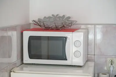 Kuhinja ili čajna kuhinja u objektu Apartment and Room Stefanija