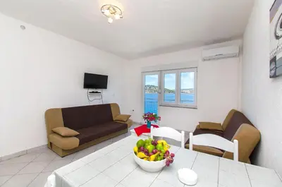 TV i/ili zabavni centar u objektu Apartments Na Obali Mora