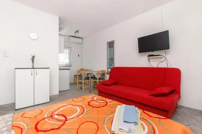TV i/ili zabavni centar u objektu Apartments Na Obali Mora