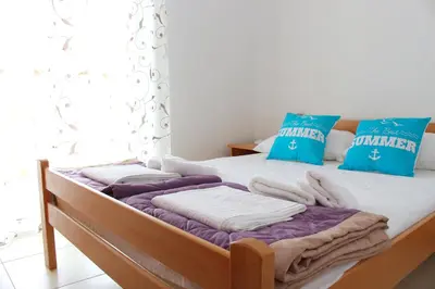 Krevet ili kreveti u jedinici u objektu Apartments Bella