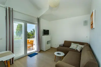 TV i/ili zabavni centar u objektu Apartments La Mirage