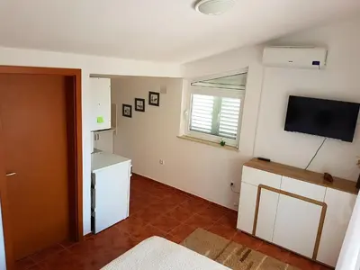 TV i/ili zabavni centar u objektu Big Apartments