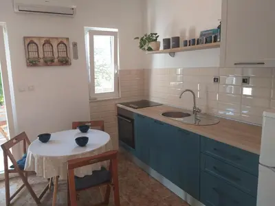 Kuhinja ili čajna kuhinja u objektu Holiday Home J-Adria
