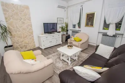TV i/ili zabavni centar u objektu Holiday Home Arboretum