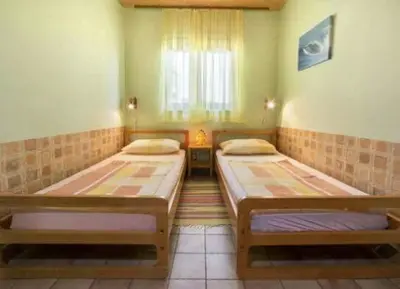 Krevet ili kreveti u jedinici u objektu Apartmani Lovrinović