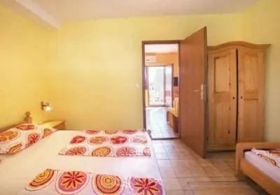 Krevet ili kreveti u jedinici u objektu Apartmani Lovrinović