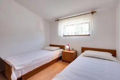 Krevet ili kreveti u jedinici u objektu Apartments Kronja