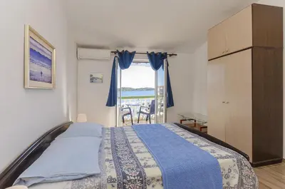 Krevet ili kreveti u jedinici u objektu Apartments Nada SeaView