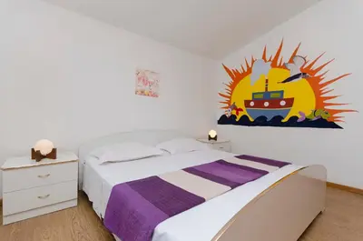 Krevet ili kreveti u jedinici u objektu Apartments Nada SeaView