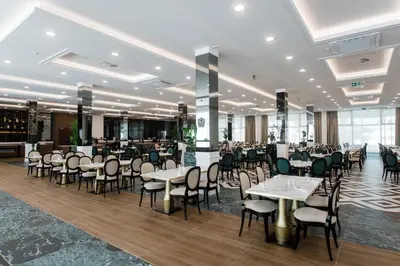 Restoran ili neka druga zalogajnica u objektu Hotel Olympia Sky
