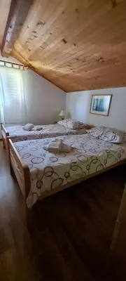Krevet ili kreveti u jedinici u objektu Apartments Rogoznička Oaza