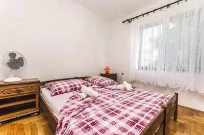 Krevet ili kreveti u jedinici u objektu Apartments Miljenka