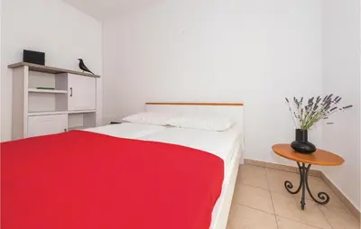 Krevet ili kreveti u jedinici u objektu Two-Bedroom Apartment In Vodice