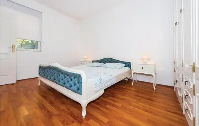 Krevet ili kreveti u jedinici u objektu One-Bedroom Apartment In Tisno