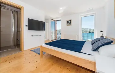 Krevet ili kreveti u jedinici u objektu Cozy Home In Kaprije With Sauna