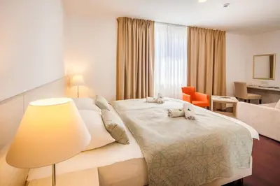 Krevet ili kreveti u jedinici u objektu Hotel Borovnik