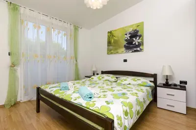 Krevet ili kreveti u jedinici u objektu Apartments Sinisa