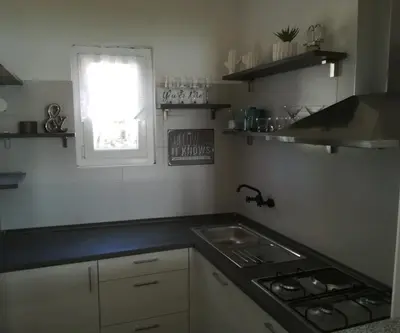 Kuhinja ili čajna kuhinja u objektu Poseidon Holiday Guesthouse