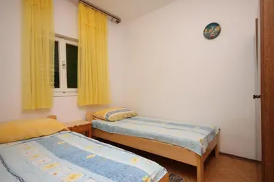 Krevet ili kreveti u jedinici u objektu Apartments by the sea Grebastica, Sibenik - 6442