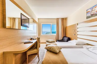 Krevet ili kreveti u jedinici u objektu Hotel Panorama
