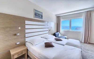 Krevet ili kreveti u jedinici u objektu Hotel Panorama