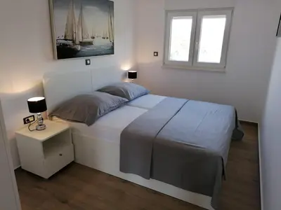 Krevet ili kreveti u jedinici u objektu Apartmani Karla