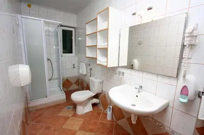 Kupaonica u objektu Apartments by the sea Rogoznica - 3094
