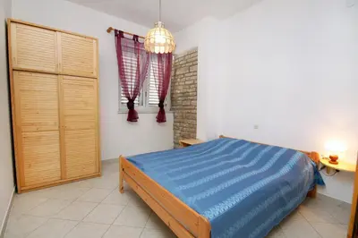 Krevet ili kreveti u jedinici u objektu Apartments by the sea Jezera, Murter - 5057