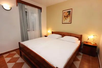 Krevet ili kreveti u jedinici u objektu Apartments by the sea Rogoznica - 3197