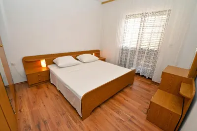 Krevet ili kreveti u jedinici u objektu Apartmani Šime