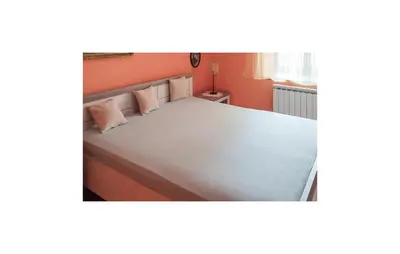Krevet ili kreveti u jedinici u objektu Three-Bedroom Holiday Home In Trbounje