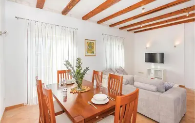 TV i/ili zabavni centar u objektu Two-Bedroom Holiday Home In Radonic