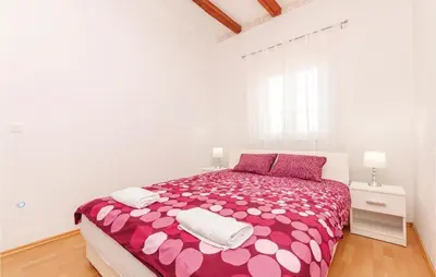 Krevet ili kreveti u jedinici u objektu Two-Bedroom Holiday Home In Radonic
