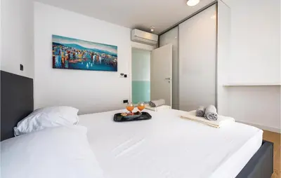 Krevet ili kreveti u jedinici u objektu Beach Front Home In Tribunj