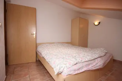 Krevet ili kreveti u jedinici u objektu Family friendly apartments with a swimming pool Vodice - 6261