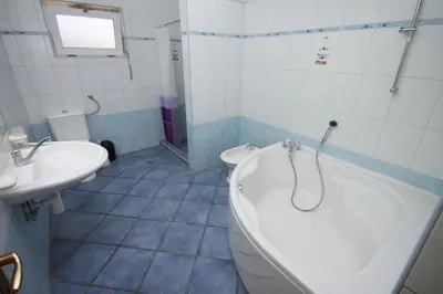Kupaonica u objektu Family friendly apartments with a swimming pool Vodice - 6261
