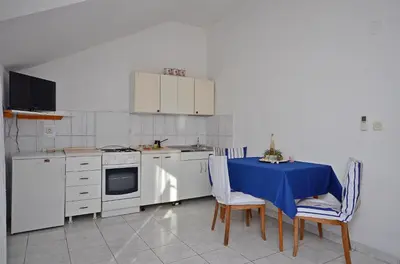 Kuhinja ili čajna kuhinja u objektu Apartments and Rooms Bepina