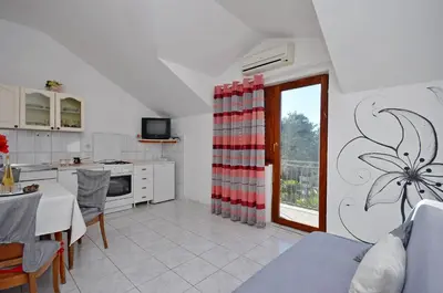 Kuhinja ili čajna kuhinja u objektu Apartments and Rooms Bepina
