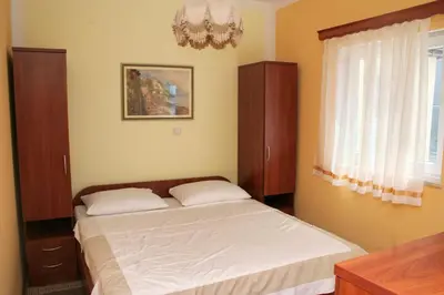 Krevet ili kreveti u jedinici u objektu Apartments and rooms by the sea Rogoznica - 3097