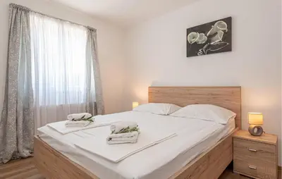 Krevet ili kreveti u jedinici u objektu Four-Bedroom Holiday Home In Zaton